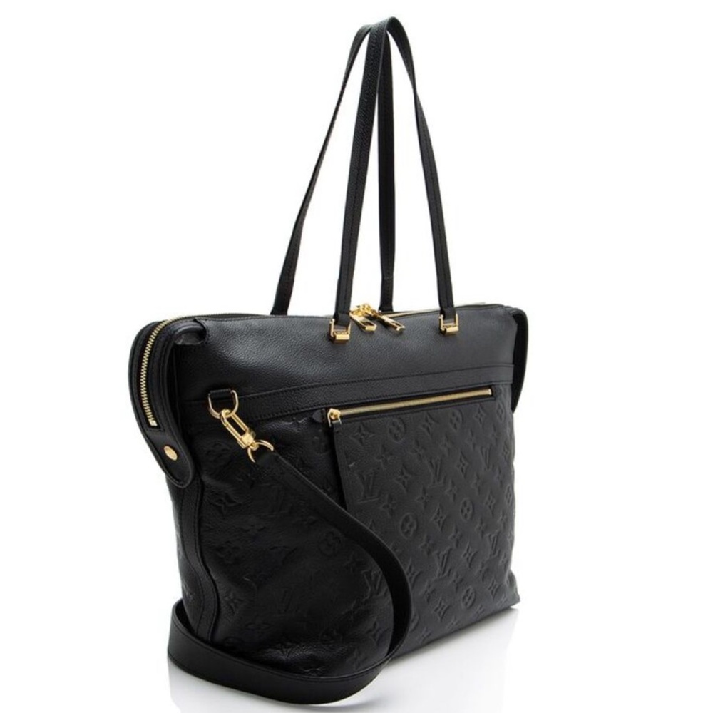 Louis Vuitton Bow tie bag. Black leather exterior. Grey and black interior.